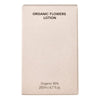 Whamisa Organic Flowers Lotion Double Rich; beige suorakaiteen muotoinen rasia tekstillä ”Organic Flowers Lotion”, merkinnät ”Organic 95%” ja ”200ml / 6.7 fl. oz.” yksinkertaisella groteskifontilla; pakkauksen pinta mattapintainen pienin kohokuvioiduin pistein oikealla reunalla; ei ihmisiä tai käsiä, tausta tasainen, kuva suoraan edestä; pelkistetty suunnittelu korostaa pieniä kohokuvioituja pisteitä.