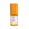 A small bottle of Saaren Taika facial oil with a cylindrical shape, topped by a rounded wooden cap. The bottle has a white label printed with fine botanical line illustrations and dark sans serif text, including the Saaren Taika brand name. The surface is matte. Product is photographed upright on a plain white background.
