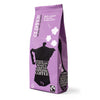 Violetti pussi Clipper Fairtrade Roast & Ground Espresso Coffee -kahvia, kuvituksena mokkapannun siluetti höyrystä muodostuvine kahvikuppeineen. Mattapinta, suorakulmainen muoto, saumattu pakkaus. Valkoinen ja musta pääteviivaton typografia. Etiketissä lukee 'tummapaahdettu ja voimakas arabica-kahvi', '227 g' sekä Fairtrade-logo. Pelkistetty tausta, ei ihmisiä tai toimintaa kuvassa.