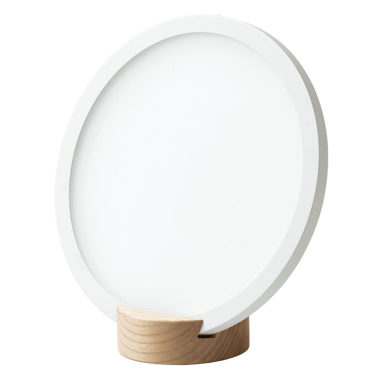 A round, white, flat disc with a thick border stands upright in a small, light wood base on a plain white background. The disc has a matte finish and no visible markings or text. The thin wooden base is rectangular with smooth edges. Background and setting are featureless; there are no visible packaging, people, hands, or actions.