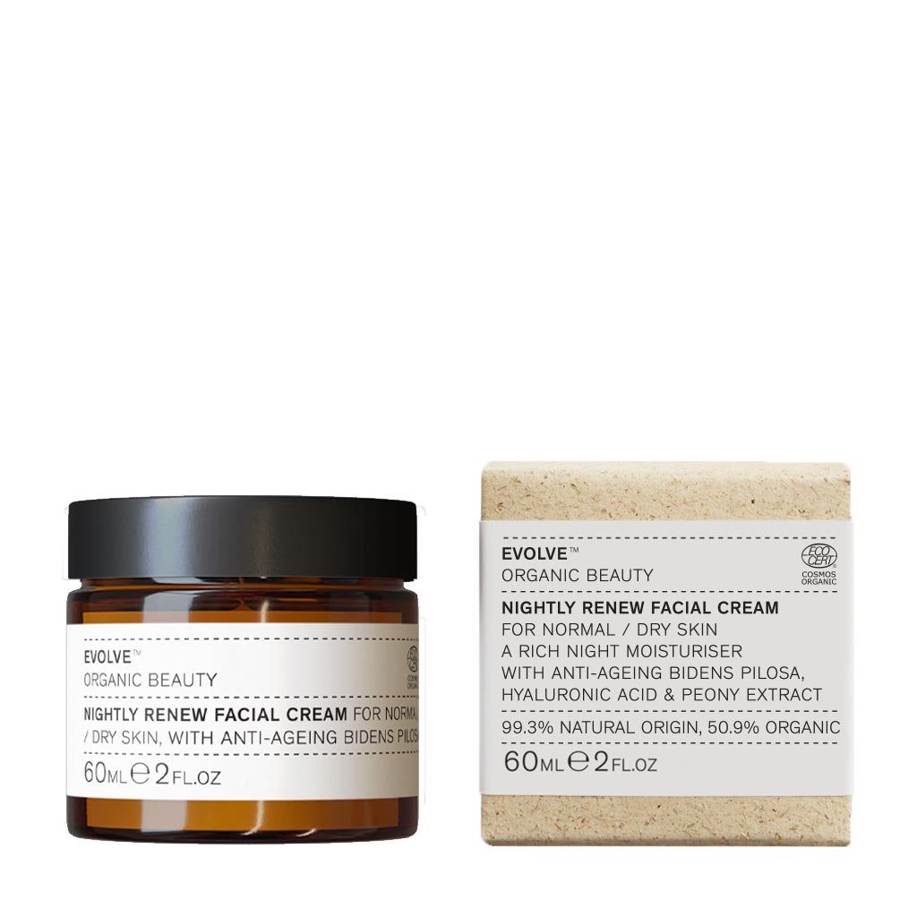 A brown cylindrical glass jar with a white rectangular label sits next to a beige cardboard box. Both items display black sans-serif text, including the product name and brief details. Surfaces are matte. The background is plain and neutral, and no people or hands are visible in the frame. Shot type is straightforward product photography on a flat surface.