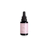 FLOW Cosmetics Arctic Beauty Oil -pullo, vaaleanpunainen etiketti, musta tiputinkorkki, vaalealla taustalla; lieriömäinen, kirkasta kiiltävää lasia, sisältää nestettä; etiketissä tuotenimi lihavoidulla groteskifontilla; ei muita näkyviä elementtejä tai lisätarvikkeita; ei ihmisiä tai käsiä.