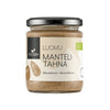 Foodin Luomu Mantelitahna -purkki, lasinen, musta muovikansi, beige mattaetiketti realistisin mantelikuvin; minimalistinen groteskiteksti suomeksi ja englanniksi