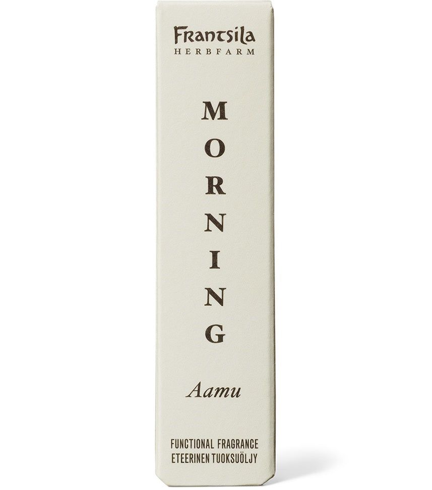 Frantsila Aamu Tuoksuöljy Roll-on -pakkaus, kermanvärinen suorakulmainen rasia, sana MORNING painettu pystysuunnassa isoin groteskikirjaimin, "Aamu" ja "Functional Fragrance" pienemmällä; mattapinta, terävät reunat