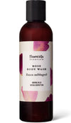 Frantsila Herb Farm Rose Body Wash (Ruusu Suihkugeeli) -pumppupullo, ruskea, valkoinen suorakaiteen muotoinen etiketti musta-pinkillä tekstillä; vaaleanpunaisia ruusunterälehtiä pullon vieressä, teksti englanniksi ja suomeksi