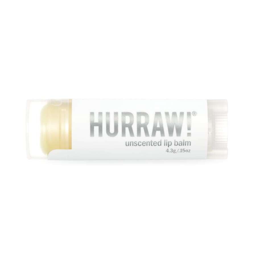 Hurraw! Huulivoide Unscented -tuubi, kirkas, valkoinen etiketti, minimalistinen; lihavoitu groteskiteksti brändinimelle, mattapintainen muovi