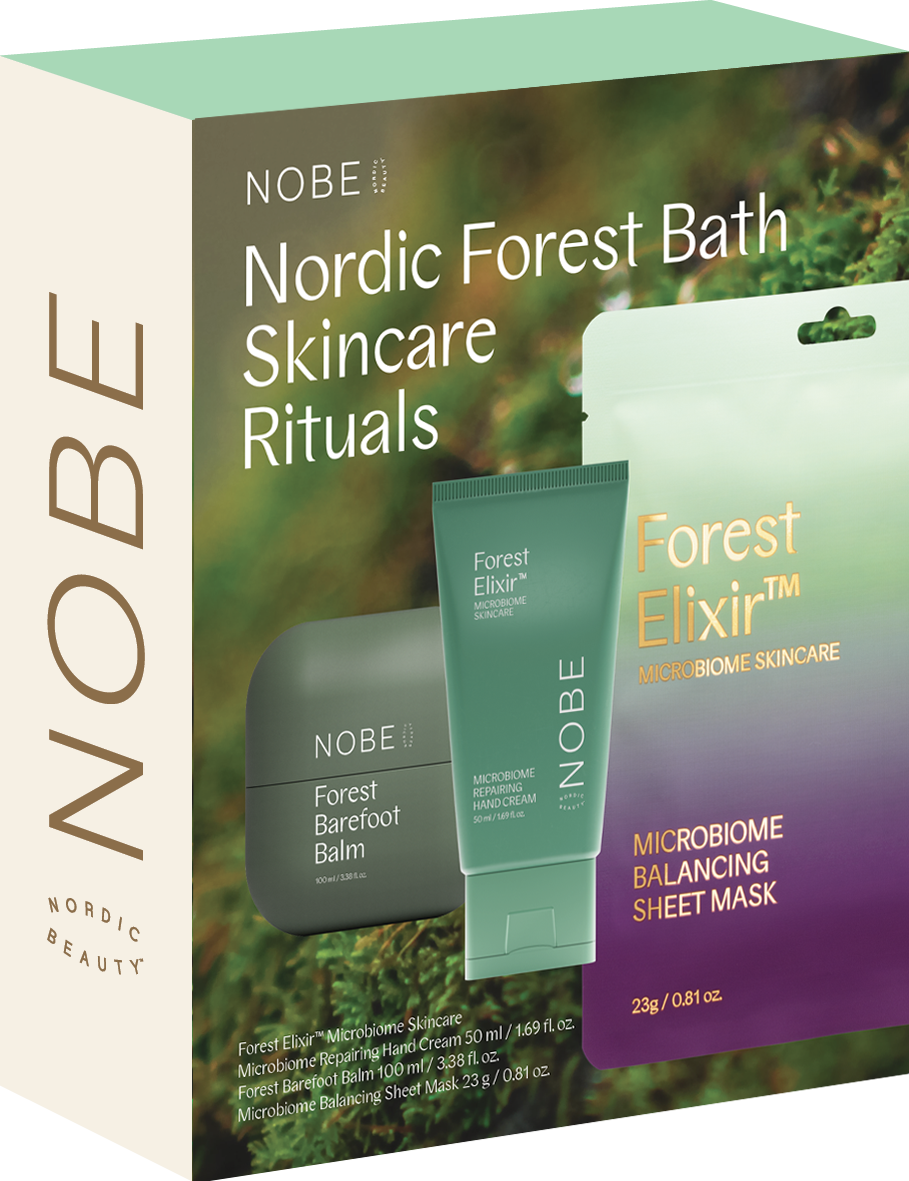 NOBE Nordic Forest Bath Skincare Rituals; lahjasetti sisältää Forest Barefoot Balm -tuubin ja Forest Elixir Microbiome Balancing -kangasnaamion, kaikki esiteltynä vihreä-violetissa liukuvärillisessä pakkauksessa, joka on inspiroitunut luonnon rauhasta.
