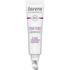 A tube of Lavera Naturkosmetik Straffende Augenpflege eye cream with 3-fach hyaluron and bakuchiol, featuring a cooling metal applicator tip for gentle application. The tube is white with silver accents, a matte finish, and has black and grey printed text in sans-serif fonts. Product name and ingredients are visible on the front label. The background is plain white. No people or hands visible.