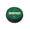 Luonkos PRIMAL Metsämikrobivoide; pyöreä metallipurkki mattavihreällä kannella, teksti "Primal Multifunctional Forest Balm by Luonkos" ja maininta luonnollisista ainesosista; purkki sileäkylkinen ja kannessa selkeästi painettu teksti; valkoinen tausta, kuvattu ylhäältä ilman ihmisiä tai muita esineitä.