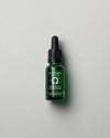 Madara Omega 3-6-9 Concentrate; vihreä lasinen tiputinpullo, vaalea tausta
