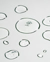 Madara Omega 3-6-9 Concentrate; lähikuva kirkkaista öljytipoista