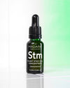 Madara Plant Stem Cell Concentrate; tiputinpullo vihreää valoa vasten