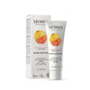 A tube and box of MOSSA Glow Cocktail Illuminating Anti-Pigmentation Cream, featuring images of cloudberry and quince. The packaging is white with orange and gold accents, matte finish, rectangular box, cylindrical tube with flip cap. Sans-serif fonts in black and gold print. Legible text references fruit acids, vegan ingredients, certified skincare for all skin types. No people or hands present; shot on plain white background.