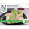 MicroLeaf-siemenpussi Nelson Gardenilta esittää näkkileipää juuston ja eloisien versojen kanssa mattamustalla lautasella, taustalla lasillinen appelsiinimehua. Siemenpussi on suorakulmainen ja kiiltäväpintainen, ja siinä on painettuja itämisohjeita. Etiketissä on valkoista pääteviivatonta typografiaa. Ihmisiä tai käsiä ei näy kuvassa.