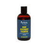 Nurme For Men Mint Rosemary Shampoo -shampoo, viilentävä vaikutus; ruskea muovipullo mustalla korkilla vaalealla taustalla; sileä, mattapintainen, lieriömäinen pullo kaltevin olkapäin; etiketissä lihavoitua valkoista lohkotekstiä ja pienempää tekstiä tuotetiedoille; suoraviivainen, edestäpäin kuvattu tuotekuva, ei ihmisiä tai käsiä.