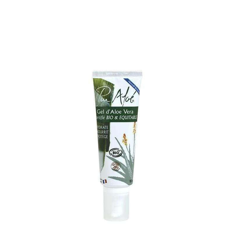 Pur Aloé Aloe Vera -ihogeeli -tuubi, valkoinen korkki; sylinterinmuotoinen puolikiiltävä tuubi, vihreä etiketti aloe-kasvikuvin sekä luomu- ja Fairtrade-sertifiointimerkein, groteskiteksti