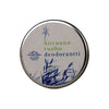 A round metal tin with a matte finish is shown. The packaging is decorated with blue grass-like graphics and includes the text “Sitruunaruohodeodorantti” and a Saaren Taika logo in clear, modern typography. The background is solid white. No people or hands are present. This is a close-up shot of the product container.
