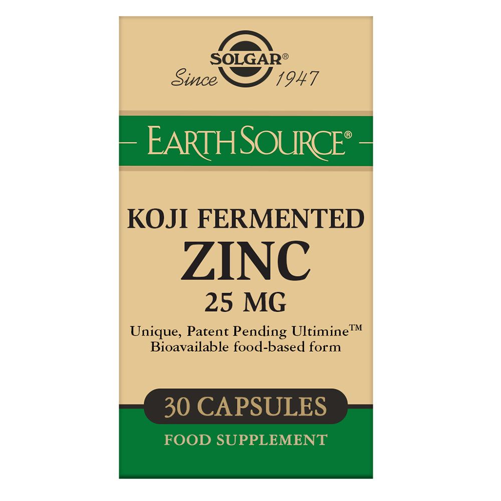 Front of a Solgar Earth Source Koji Fermented Zinc supplement box, 25 mg, 30 capsules, featuring green and beige colors and text highlighting its bioavailable, food-based zinc formula made from fermented ingredients. The box is rectangular with a matte finish. Bold serif and sans-serif fonts are used for the brand name and product details. There are no people or hands in the image. Plain background; studio-style shot.