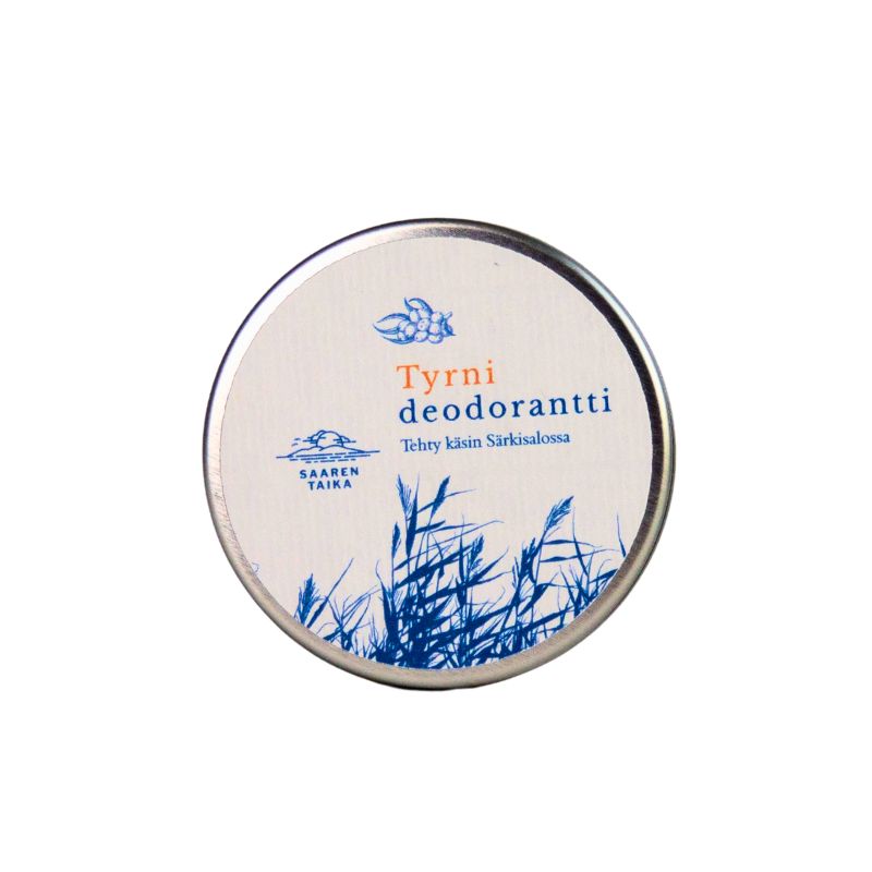 A round metal tin with a matte finish is labeled “Tyrni deodorantti” in orange and blue text, with a small bee graphic. The lid displays blue grass illustrations on a white background. The tin is photographed against a plain white backdrop. No people or hands are present. Other label details describe the product’s qualities, but only core text is legible.