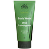 Urtekram Blown Away Wild Lemongrass Suihkusaippua; vihreä Urtekram Blown Away Body Wash Wild Lemongrass -tuubi, 200 ml; tuubi sileä mattapinnalla, lieriömäinen muoto; heinäkuvituksia alareunassa; valkoista ja keltaista tekstiä, joka listaa tuotenimen sekä ilmoittaa luomusertifioinnista ja 100-prosenttisesta luonnollisesta alkuperästä; ei ihmisiä tai käsiä; vaalea tausta, kuvattu edestä.