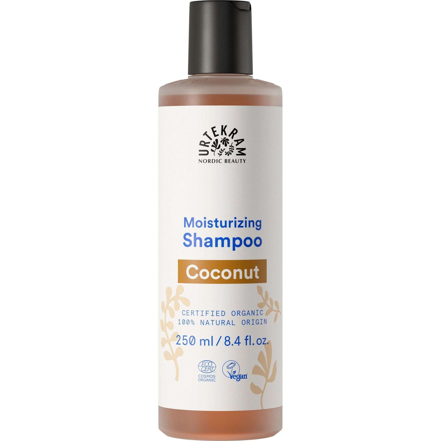 Urtekram Kookos Shampoo (Nordic Beauty) -pullo, 250 ml, valkoinen läpinäkymätön muovi, mattahopeinen läpsykorkki; valkoinen suorakulmainen etiketti mustalla ja kultaisella groteskitekstillä, kultaiset kasvikuviot ja luomumerkit