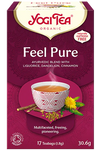 YogiTea Luomu Detox Dandelion -pakkaus (Feel Pure), teekuppi kanelitankojen, voikukan ja lakritsin kanssa; eloisa violetti mattapintainen rasia kasvikuvituksin, valkoinen-keltainen lihavoitu serifiteksti, 17 kofeiinitonta teepussia