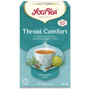YogiTea Luomu Throat Comfort -teepakkaus; suorakulmainen, mattapintainen rasia oranssin ja keltaisen sävyissä; etiketissä teekuppi yrttikuvitusten ympäröimänä; valkoisella ja ruskealla tekstausvapaalla kirjasimella lueteltuna lakritsi, fenkoli, timjami ja salvia sekä maininnat 17 teepussista ja kofeiinittomuudesta; kuvattu yksiväristä taustaa vasten, ei ihmisiä tai käsiä näkyvissä.