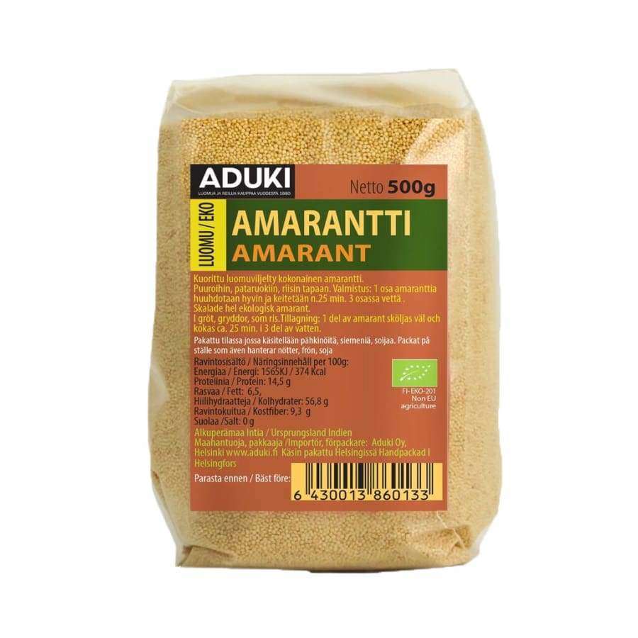 Aduki Luomu Amarantti, 500 g; pystyssä oleva, mattapintainen muovipussi, jonka läpi näkyy keltaisia jyviä sekä suomenkielistä tuotetietoa etiketissä; lihavoitua mustaa ja vihreää groteskitekstiä; tuote kuvattu edestäpäin vaalealla taustalla.