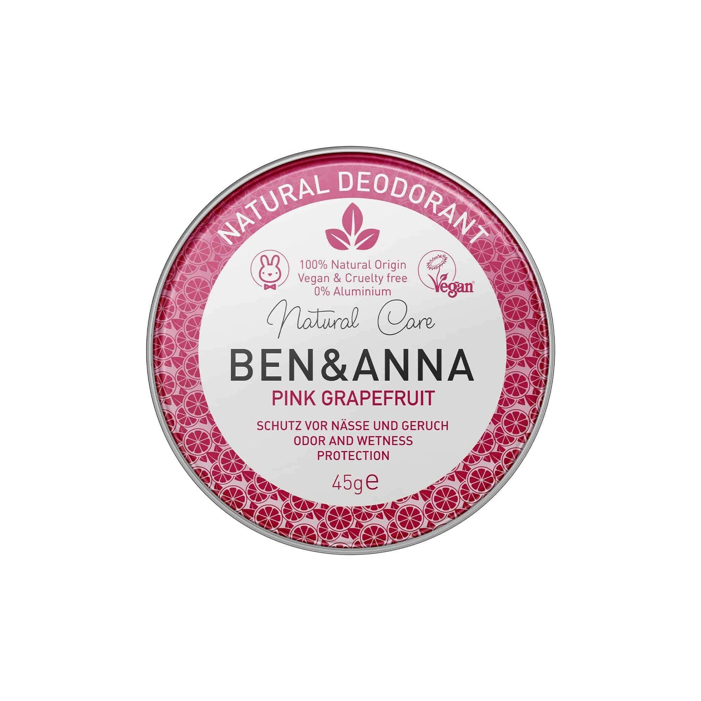 Ben & Anna Voidedeodorantti Pink Grapefruit; pyöreä peltirasia Ben & Anna Natural Care Pink Grapefruit -deodoranttia, merkitty vegaaniseksi, eläinkokeettomaksi ja alumiinittomaksi, nettopaino 45 g; etiketti vaaleanpunainen valkoisin korostuksin ja saksankielinen teksti; rasia mattapintainen; typografia yksinkertaista groteskia; ei ihmisiä tai käsiä; tuote kuvattu neutraalia taustaa vasten suoraviivaisessa kuvassa.