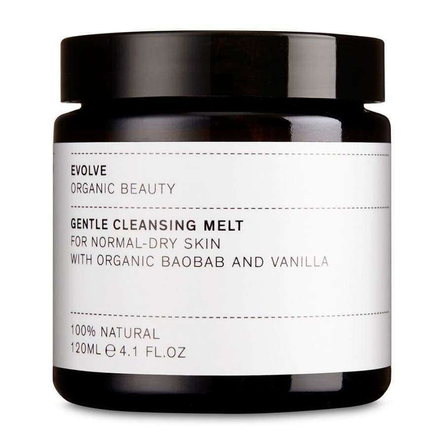 Evolve Gentle Cleansing Melt Puhdistusbalmi -purkki, 120 ml; musta, sylinterimäinen ja mattapintainen purkki yhtenevällä kierrekannella; valkoisessa etiketissä mustaa tekstausvapaata tekstiä normaalille ja kuivalle iholle sopivasta tuotteesta, jossa luomubaobabia, vaniljaa ja muita luonnollisia ainesosia; kuvattu vaaleaa taustaa vasten, ei ihmisiä tai muita esineitä.