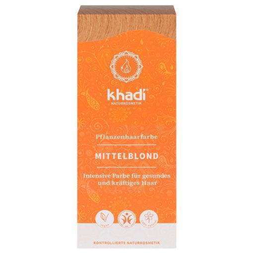 Khadi Kasvihiusväri Medium Blonde; oranssi-beige suorakulmainen Khadi Naturkosmetik -kasvipohjaisen hiusvärin rasia sävyllä Mittelblond, mattapinnalla; pakkauksessa groteskitypografiaa ja luettavaa tekstiä, joka kuvaa tuotteen luonnolliseksi hiusväriksi terveille ja vahvoille hiuksille; kuva vaaleaa taustaa vasten, ei ihmisiä tai muita esineitä näkyvissä.