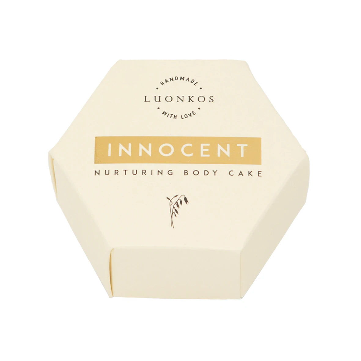 Luonkos Innocent Nurturing Body Cake, teksti "Handmade with Love"; kuusikulmainen kermanvärinen rasia mattapinnalla, kartonkimateriaalia, kannellinen; mustaa groteski- ja käsialatekstiä keskitettynä kannen yläosaan; pieni kaurakuvitus painettu pääotsikon alle; valkoinen tausta, ei näkyviä ihmisiä tai käsiä; tuote kuvattu kokonaisuudessaan ylhäältäpäin.