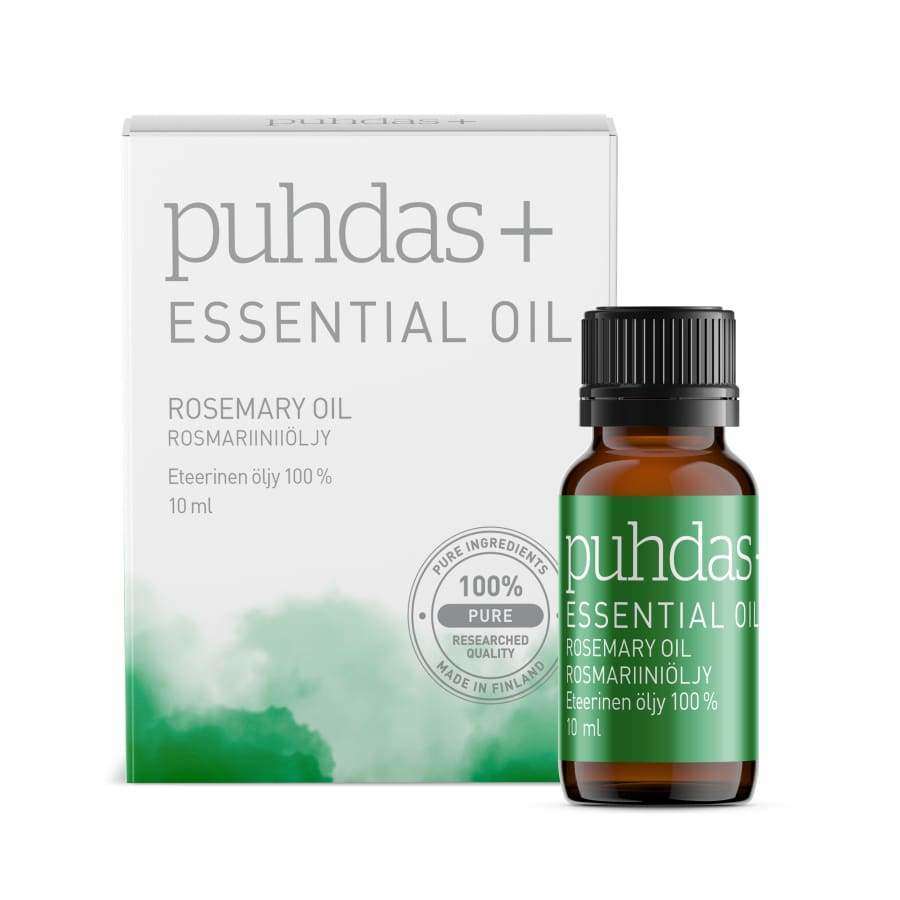 puhdas+ ESSENTIAL OIL ROSEMARY OIL -pullo, pieni ruskea pullo vastaavan valkoisen ja vihreän laatikon edessä "100 % PURE" -sinetillä, korostaen puhdasta eteerisen öljyn koostumusta; sekä pullo että laatikko mattapintaisia; teksti painettu lihavoidulla tekstausvapaalla fontilla; kuva otettu valkoista taustaa vasten, ei ihmisiä tai käsiä näkyvissä.