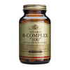 Solgar Vitamiini B-Complex 100 Extra High Potency -pullo, 100 tablettia, sopii vegaaneille, ei sokeria, suolaa tai tärkkelystä; ruskea lasipullo metallinkultaisella kierrekorkilla, mattapintainen beige etiketti mustalla tekstillä