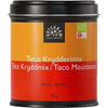 Urtekram Luomu Taco Mausteseos -metallipurkki, 70 g; sylinterimäinen, mattapintainen ja hopeanvärinen purkki sopivalla kannella; oranssissa etiketissä monikielistä tekstiä, luomusertifiointimerkkejä ja mainintoja luonnollisista ainesosista; lihavoitua mustaa ja valkoista tekstausvapaata tekstiä; kuvattu valkoista taustaa vasten, ei ihmisiä tai esineitä näkyvissä.